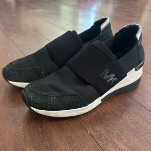 Michael Kors black slip on sneakers Size 9